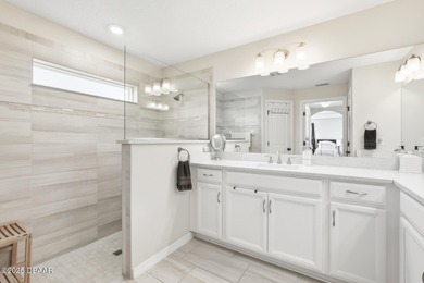 Immaculate Seagate-built Willow model located in the desirable on The Grand Club - Pine Lakes Course in Florida - for sale on GolfHomes.com, golf home, golf lot