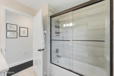 Immaculate Seagate-built Willow model located in the desirable on The Grand Club - Pine Lakes Course in Florida - for sale on GolfHomes.com, golf home, golf lot