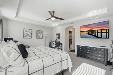 Immaculate Seagate-built Willow model located in the desirable on The Grand Club - Pine Lakes Course in Florida - for sale on GolfHomes.com, golf home, golf lot