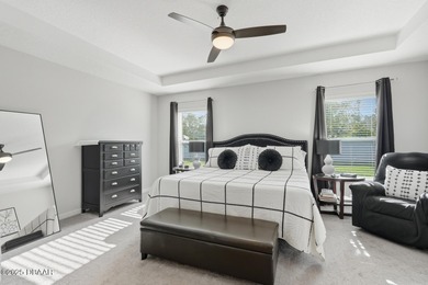 Immaculate Seagate-built Willow model located in the desirable on The Grand Club - Pine Lakes Course in Florida - for sale on GolfHomes.com, golf home, golf lot