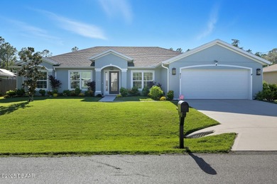 Immaculate Seagate-built Willow model located in the desirable on The Grand Club - Pine Lakes Course in Florida - for sale on GolfHomes.com, golf home, golf lot