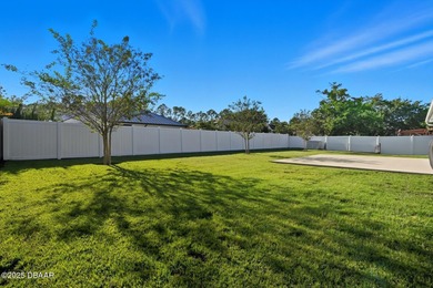 Immaculate Seagate-built Willow model located in the desirable on The Grand Club - Pine Lakes Course in Florida - for sale on GolfHomes.com, golf home, golf lot