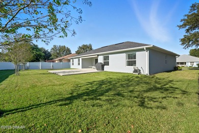 Immaculate Seagate-built Willow model located in the desirable on The Grand Club - Pine Lakes Course in Florida - for sale on GolfHomes.com, golf home, golf lot