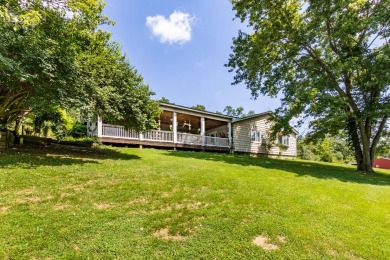 Welcome home to this serene surrounding ranch style home on Hidden Valley Golf Club in Indiana - for sale on GolfHomes.com, golf home, golf lot