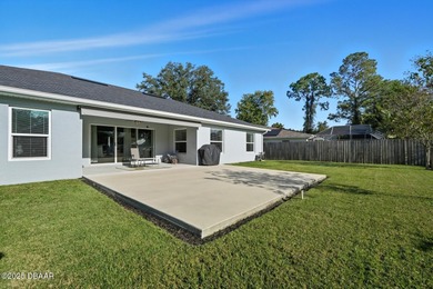 Immaculate Seagate-built Willow model located in the desirable on The Grand Club - Pine Lakes Course in Florida - for sale on GolfHomes.com, golf home, golf lot