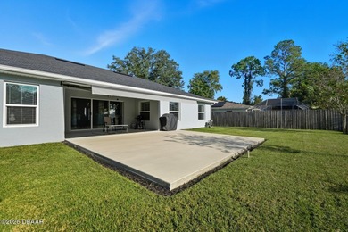 Immaculate Seagate-built Willow model located in the desirable on The Grand Club - Pine Lakes Course in Florida - for sale on GolfHomes.com, golf home, golf lot