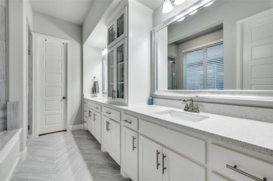 This American Legend built one story ranch home with backyard on The Tribute At the Colony in Texas - for sale on GolfHomes.com, golf home, golf lot