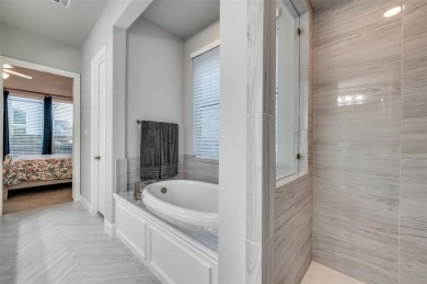 This American Legend built one story ranch home with backyard on The Tribute At the Colony in Texas - for sale on GolfHomes.com, golf home, golf lot