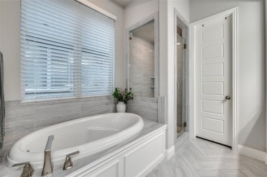 This American Legend built one story ranch home with backyard on The Tribute At the Colony in Texas - for sale on GolfHomes.com, golf home, golf lot
