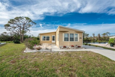 GREAT PRICE on this updated doublewide lakefront FULLY FURNISHED on Lemon Bay Golf Club in Florida - for sale on GolfHomes.com, golf home, golf lot