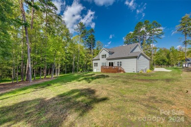 This breathtaking 5-bedroom, 4.5-bathroom luxury home combines on Olde Sycamore Golf Plantation in North Carolina - for sale on GolfHomes.com, golf home, golf lot