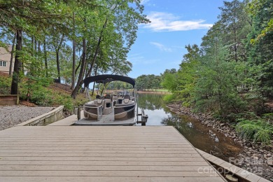 Situated on 1.3 acres in The Point's prestigious Sturbridge on Trump National Golf Club Charlotte in North Carolina - for sale on GolfHomes.com, golf home, golf lot