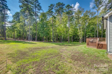 This breathtaking 5-bedroom, 4.5-bathroom luxury home combines on Olde Sycamore Golf Plantation in North Carolina - for sale on GolfHomes.com, golf home, golf lot