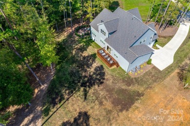 This breathtaking 5-bedroom, 4.5-bathroom luxury home combines on Olde Sycamore Golf Plantation in North Carolina - for sale on GolfHomes.com, golf home, golf lot