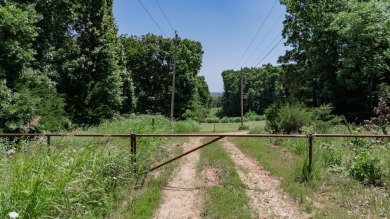 Roughly four and a half acres tucked just outside the Stockton on Stockton Country Club in Missouri - for sale on GolfHomes.com, golf home, golf lot