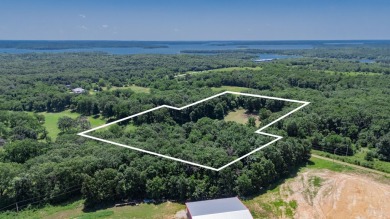 Roughly four and a half acres tucked just outside the Stockton on Stockton Country Club in Missouri - for sale on GolfHomes.com, golf home, golf lot