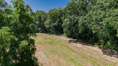 Roughly four and a half acres tucked just outside the Stockton on Stockton Country Club in Missouri - for sale on GolfHomes.com, golf home, golf lot