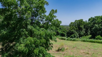Roughly four and a half acres tucked just outside the Stockton on Stockton Country Club in Missouri - for sale on GolfHomes.com, golf home, golf lot