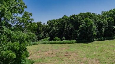 Roughly four and a half acres tucked just outside the Stockton on Stockton Country Club in Missouri - for sale on GolfHomes.com, golf home, golf lot
