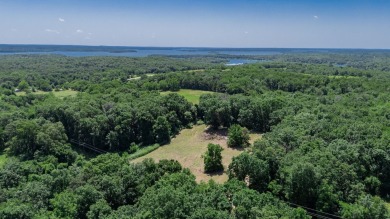Roughly four and a half acres tucked just outside the Stockton on Stockton Country Club in Missouri - for sale on GolfHomes.com, golf home, golf lot