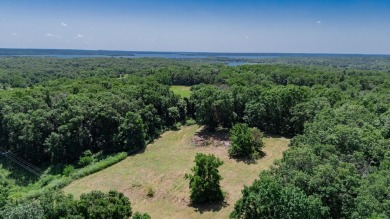 Roughly four and a half acres tucked just outside the Stockton on Stockton Country Club in Missouri - for sale on GolfHomes.com, golf home, golf lot
