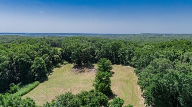 Roughly four and a half acres tucked just outside the Stockton on Stockton Country Club in Missouri - for sale on GolfHomes.com, golf home, golf lot