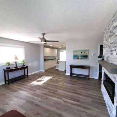 Welcome to this unique home in the 55+ neighborhood of on Mainlands Golf Club in Florida - for sale on GolfHomes.com, golf home, golf lot