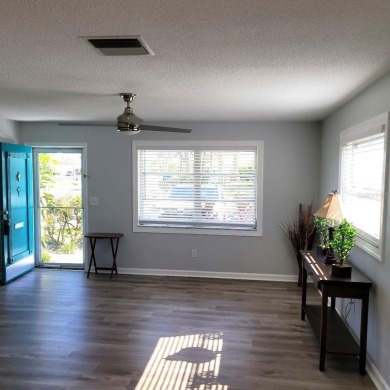 Welcome to this unique home in the 55+ neighborhood of on Mainlands Golf Club in Florida - for sale on GolfHomes.com, golf home, golf lot