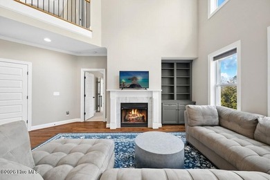 Situated on a corner lot, this home welcomes you with a concrete on The Neuse Golf Club in North Carolina - for sale on GolfHomes.com, golf home, golf lot