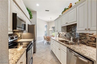 NEW ROOF, NEW AC, 3 GARAGE SPACES & accordion shutters on Herons Glen Golf and Country Club in Florida - for sale on GolfHomes.com, golf home, golf lot