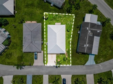 Rare opportunity to own a concrete block, single-family home in on Spanish Lakes Fairways in Florida - for sale on GolfHomes.com, golf home, golf lot