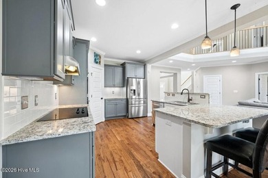 Situated on a corner lot, this home welcomes you with a concrete on The Neuse Golf Club in North Carolina - for sale on GolfHomes.com, golf home, golf lot