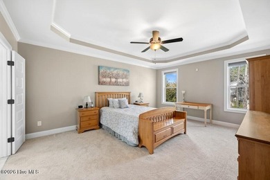 Situated on a corner lot, this home welcomes you with a concrete on The Neuse Golf Club in North Carolina - for sale on GolfHomes.com, golf home, golf lot