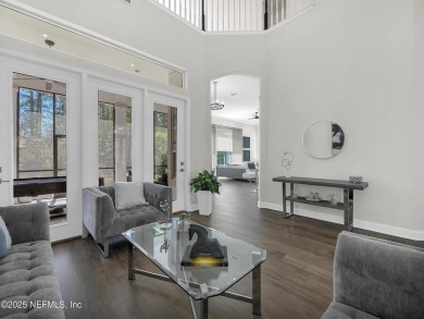 Experience the pinnacle of luxury living in this stunning on Golf Club At South Hampton in Florida - for sale on GolfHomes.com, golf home, golf lot