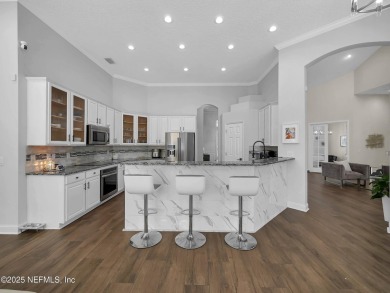 Experience the pinnacle of luxury living in this stunning on Golf Club At South Hampton in Florida - for sale on GolfHomes.com, golf home, golf lot