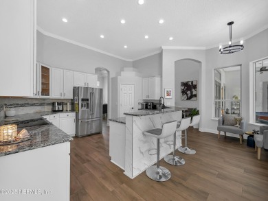 Experience the pinnacle of luxury living in this stunning on Golf Club At South Hampton in Florida - for sale on GolfHomes.com, golf home, golf lot
