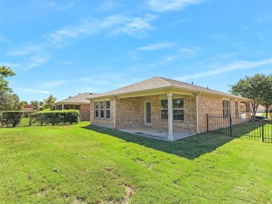 COMPLETELY FENCED Home with an open back yard view on this on Frisco Lakes Golf Course in Texas - for sale on GolfHomes.com, golf home, golf lot