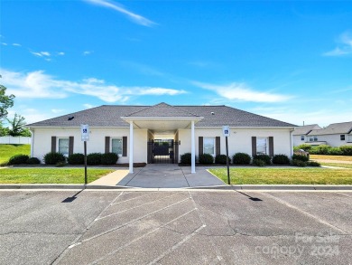 This exquisite, move-in-ready townhome in Statesville's esteemed on Fox Den Country Club in North Carolina - for sale on GolfHomes.com, golf home, golf lot