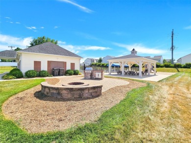 This exquisite, move-in-ready townhome in Statesville's esteemed on Fox Den Country Club in North Carolina - for sale on GolfHomes.com, golf home, golf lot