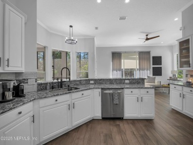 Experience the pinnacle of luxury living in this stunning on Golf Club At South Hampton in Florida - for sale on GolfHomes.com, golf home, golf lot