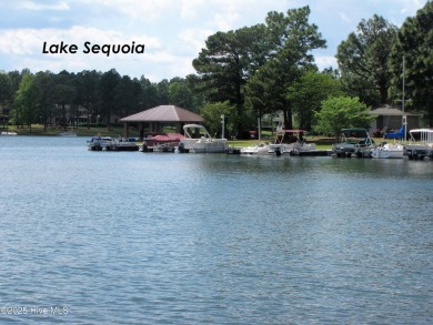 Golf front lot on Berkshire Court in the desirable gated on Seven Lakes Country Club in North Carolina - for sale on GolfHomes.com, golf home, golf lot