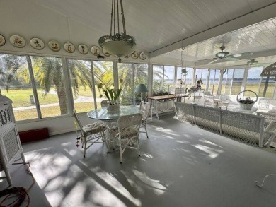 This charming home is perfectly located near the clubhouse and on Four Lakes Golf Club in Florida - for sale on GolfHomes.com, golf home, golf lot