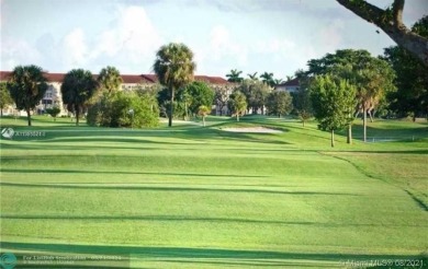 THIS 55+ 3RD FLOOR CORNER UNIT IN CENTURY VILLAGE HAS LAKE AND on Grand Palms Hotel and Golf Resort in Florida - for sale on GolfHomes.com, golf home, golf lot