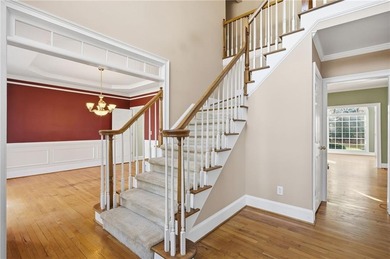 Tucked away on a quiet, double cul-de-sac street is the stately on Brookstone Golf and Country Club in Georgia - for sale on GolfHomes.com, golf home, golf lot