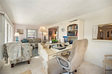 Fully furnished manufactured home in a 55+ waterfront gulf on Riverbend Golf and Country Club in Florida - for sale on GolfHomes.com, golf home, golf lot