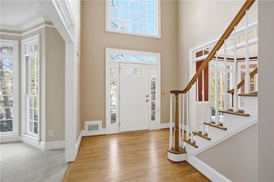 Tucked away on a quiet, double cul-de-sac street is the stately on Brookstone Golf and Country Club in Georgia - for sale on GolfHomes.com, golf home, golf lot