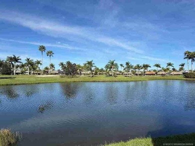 Welcome to this exceptional lakeshore lot boasting expansive on Motorcoach Resort Golf Course in Florida - for sale on GolfHomes.com, golf home, golf lot