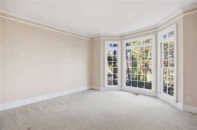 Tucked away on a quiet, double cul-de-sac street is the stately on Brookstone Golf and Country Club in Georgia - for sale on GolfHomes.com, golf home, golf lot