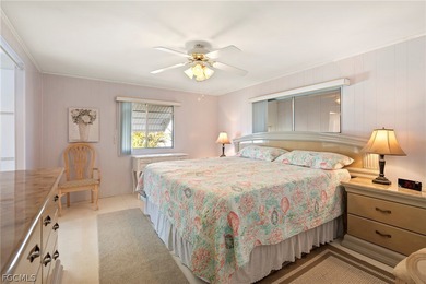 Fully furnished manufactured home in a 55+ waterfront gulf on Riverbend Golf and Country Club in Florida - for sale on GolfHomes.com, golf home, golf lot