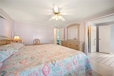 Fully furnished manufactured home in a 55+ waterfront gulf on Riverbend Golf and Country Club in Florida - for sale on GolfHomes.com, golf home, golf lot